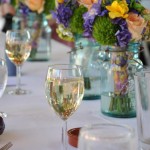 Wedding Wine glasses on a table with flowers