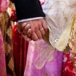 A Muslim Couple holding hands.