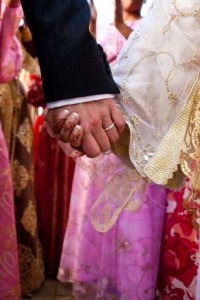 A Muslim Couple holding hands.